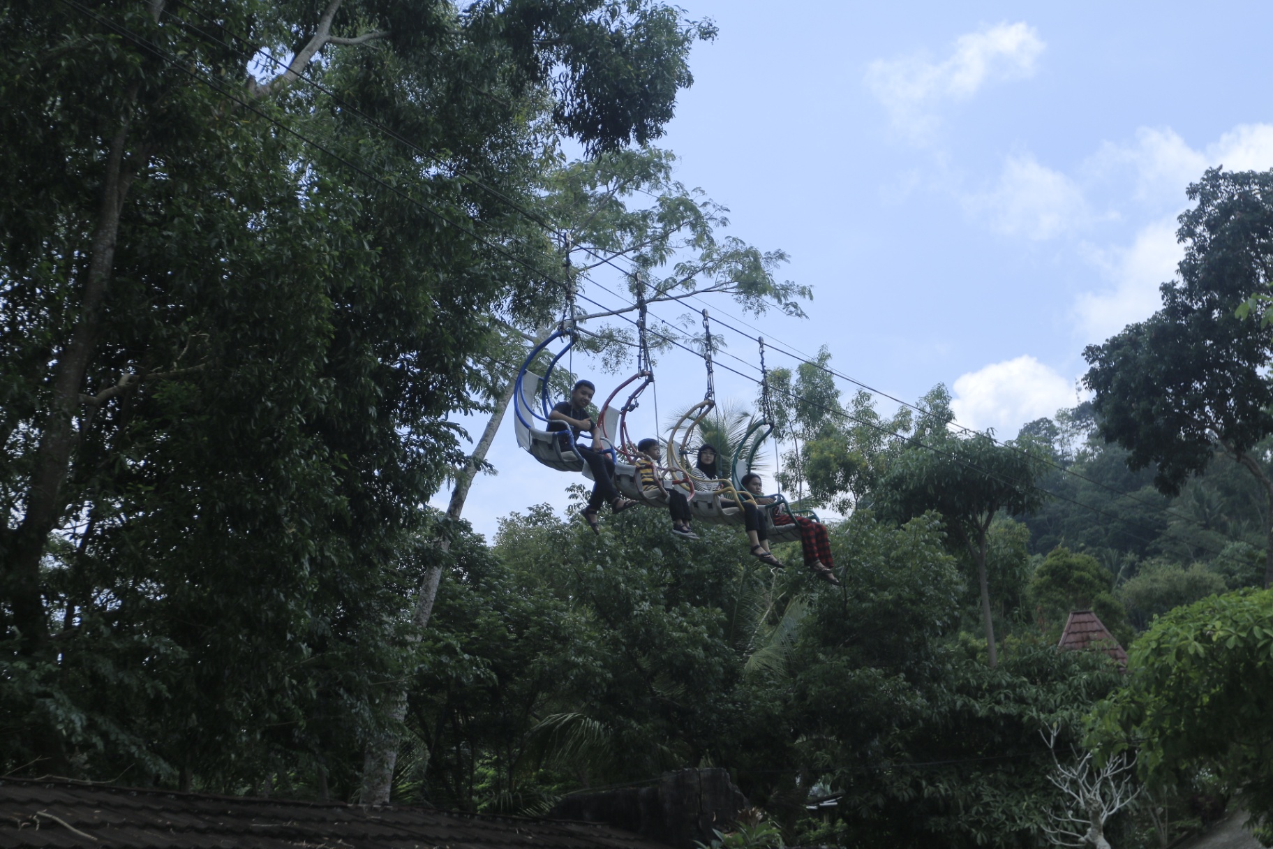 Off-road jeep crossing a jungle trail in Kulon Progo