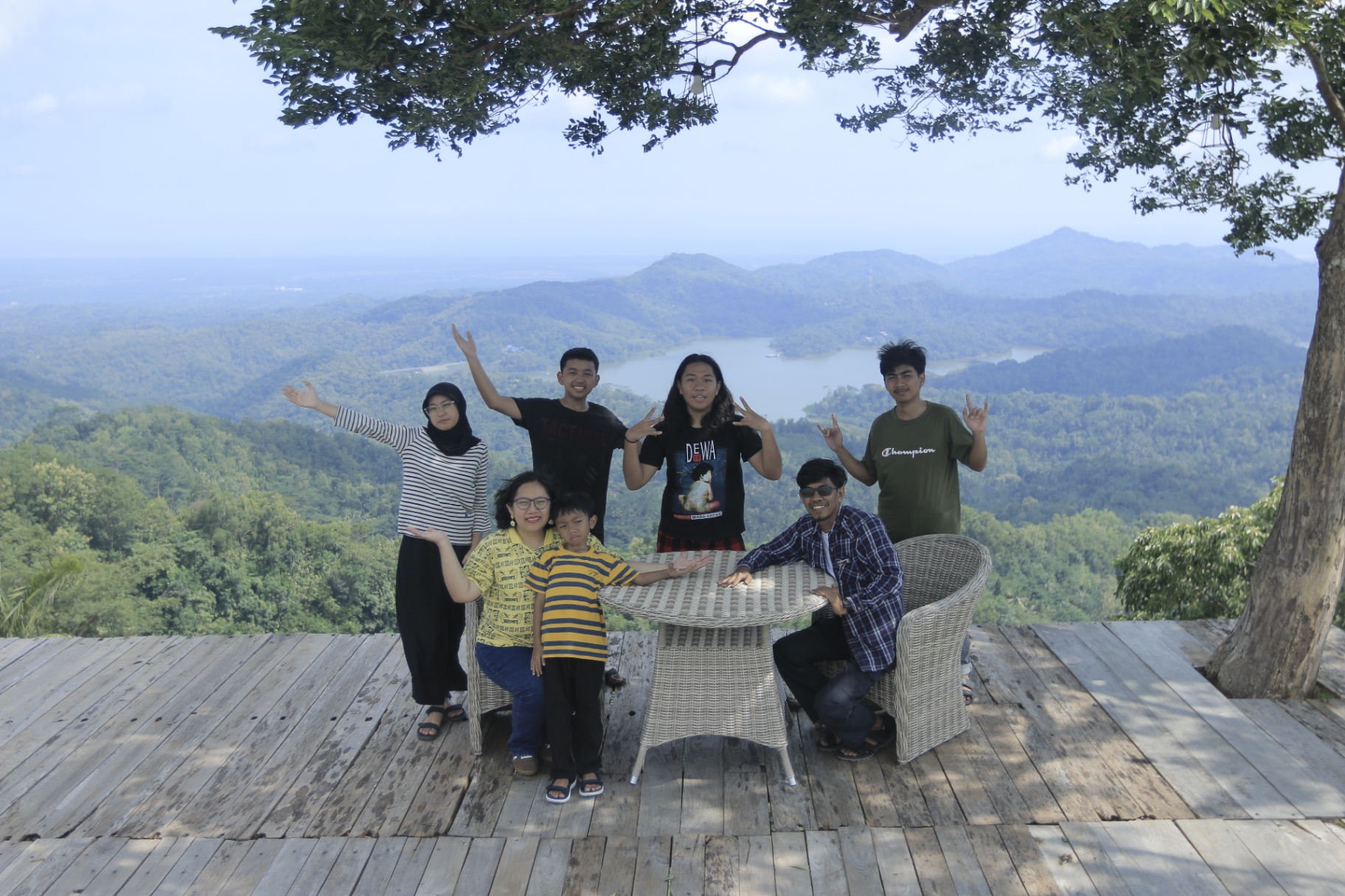 Travelers posing with a jeep on a Kulon Progo trail